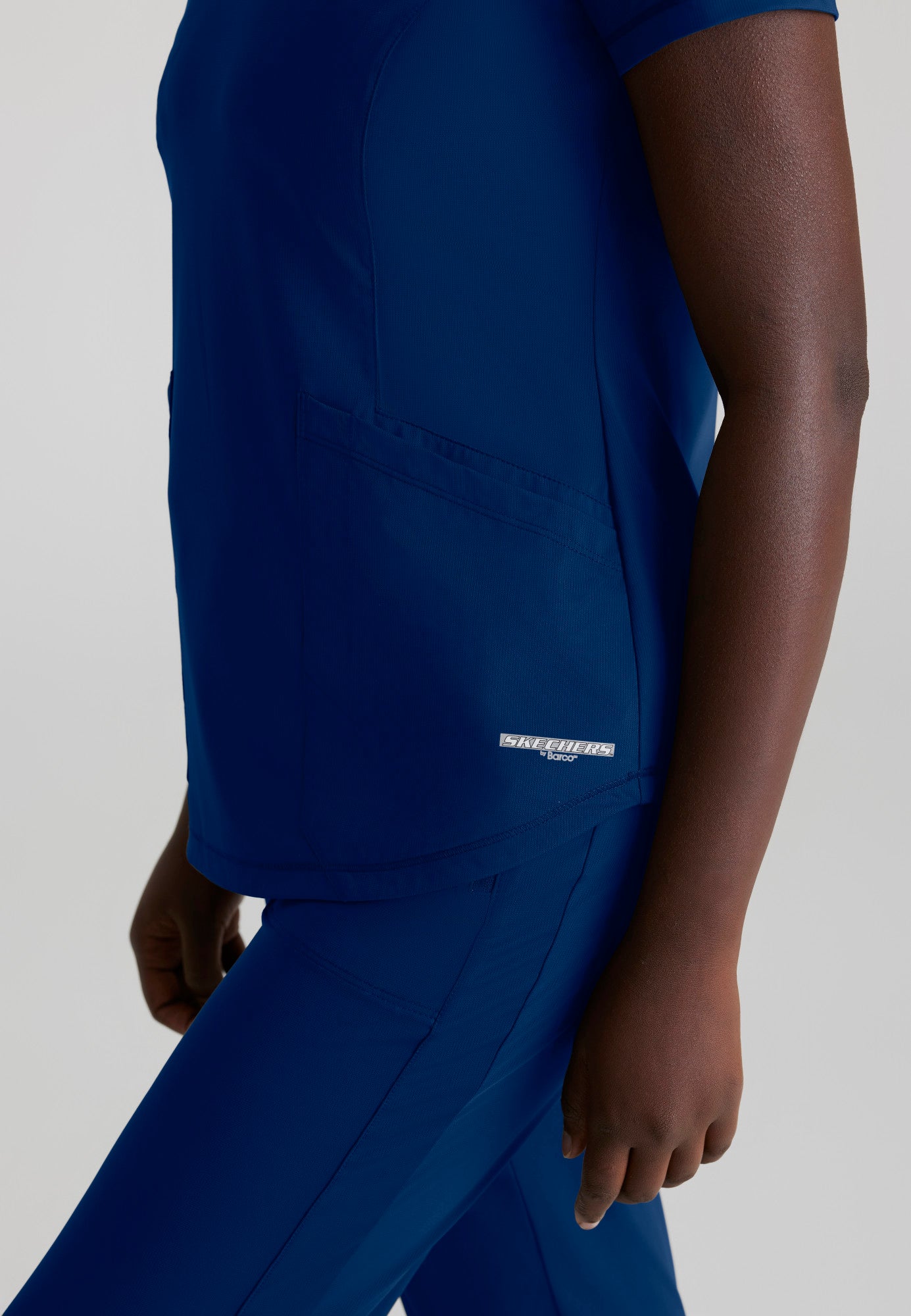 Haut Serene à 3 poches et col en V