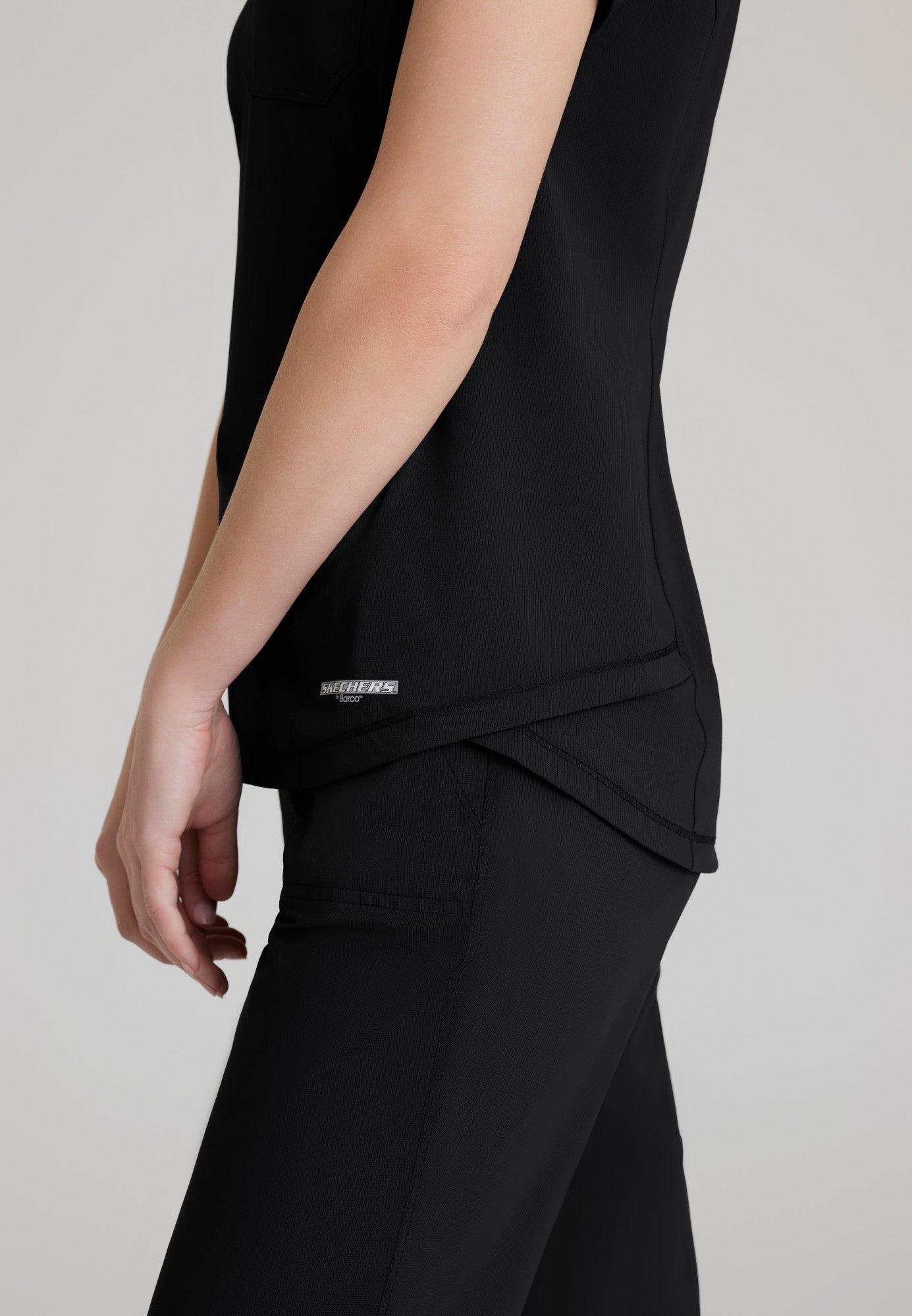 Haut d'uniforme Flow à une poche