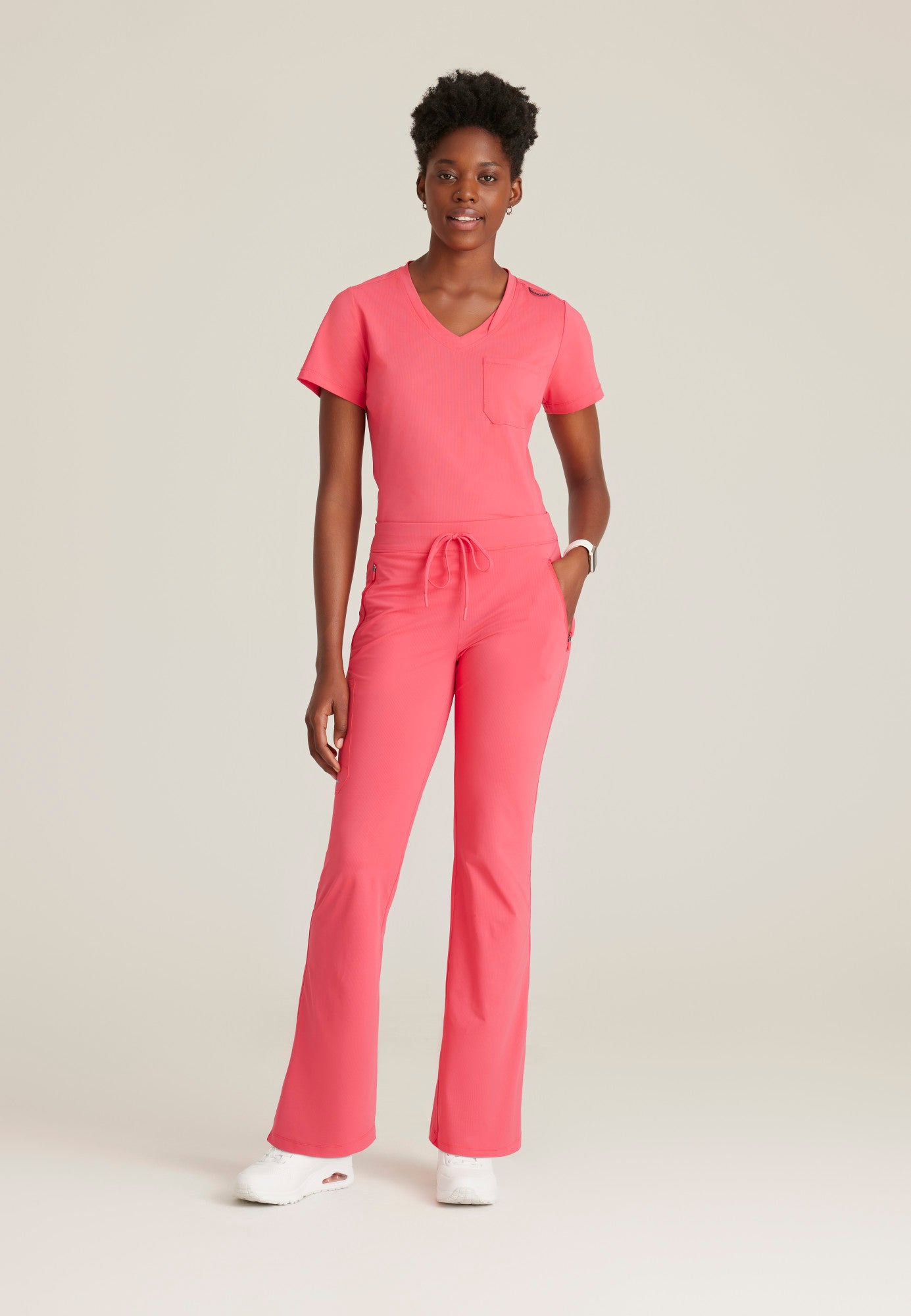 Haut d'uniforme Flow à une poche